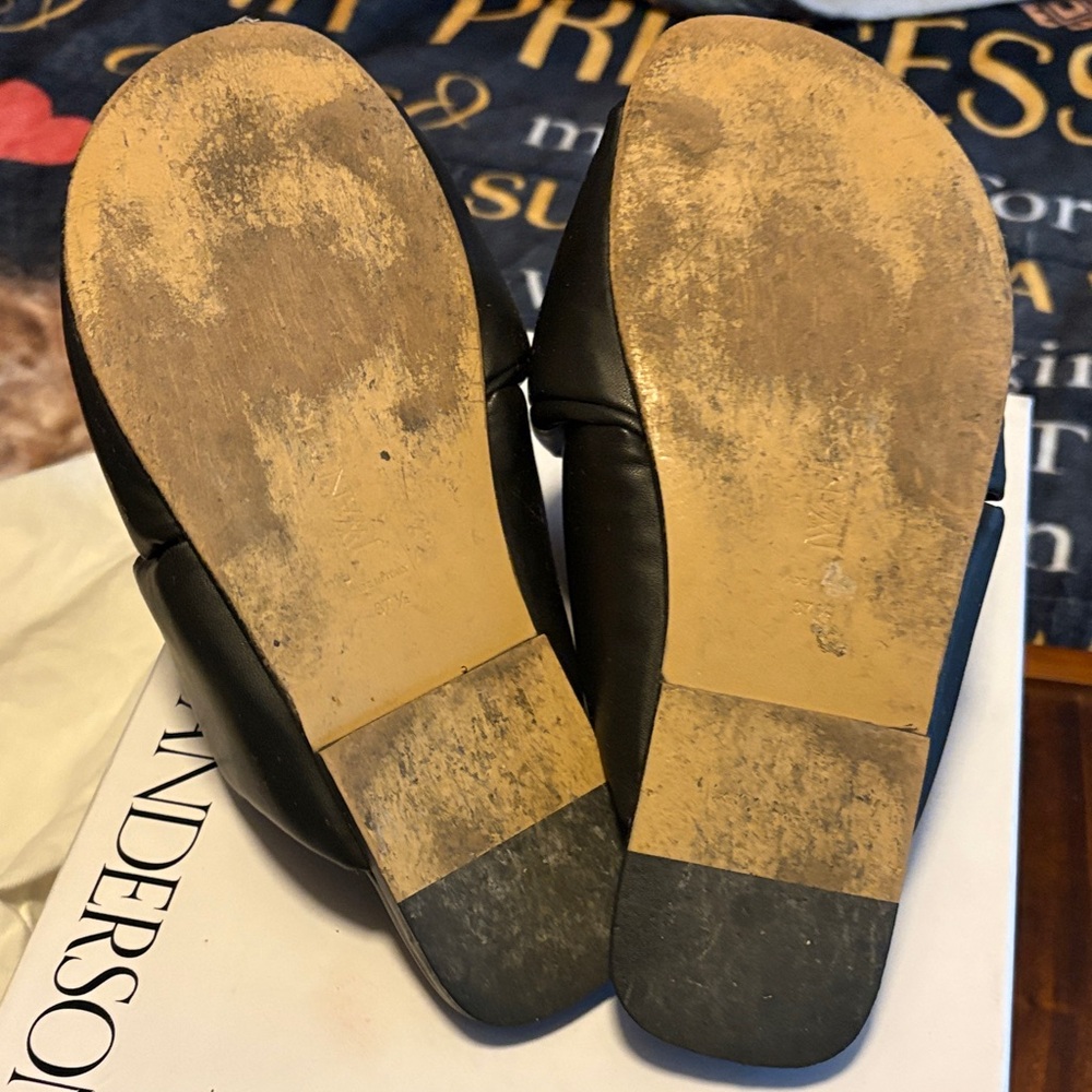 JW ANDERSON Black Twisted Leather Slide Sandals with Gold Disc - Picture 7 of 9